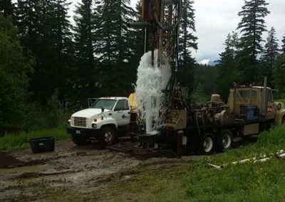 Breaking through while drilling a water well.